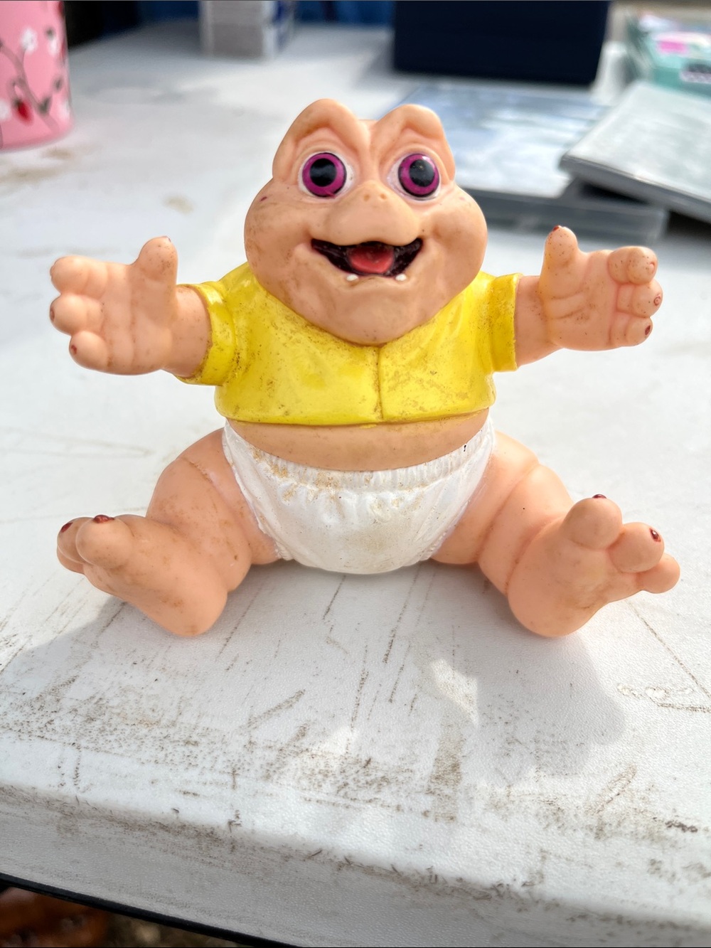 Disney Baby Frog Figurine in Yellow Shirt with Pink Eyes